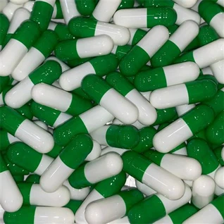 Grønne og hvite kapsler